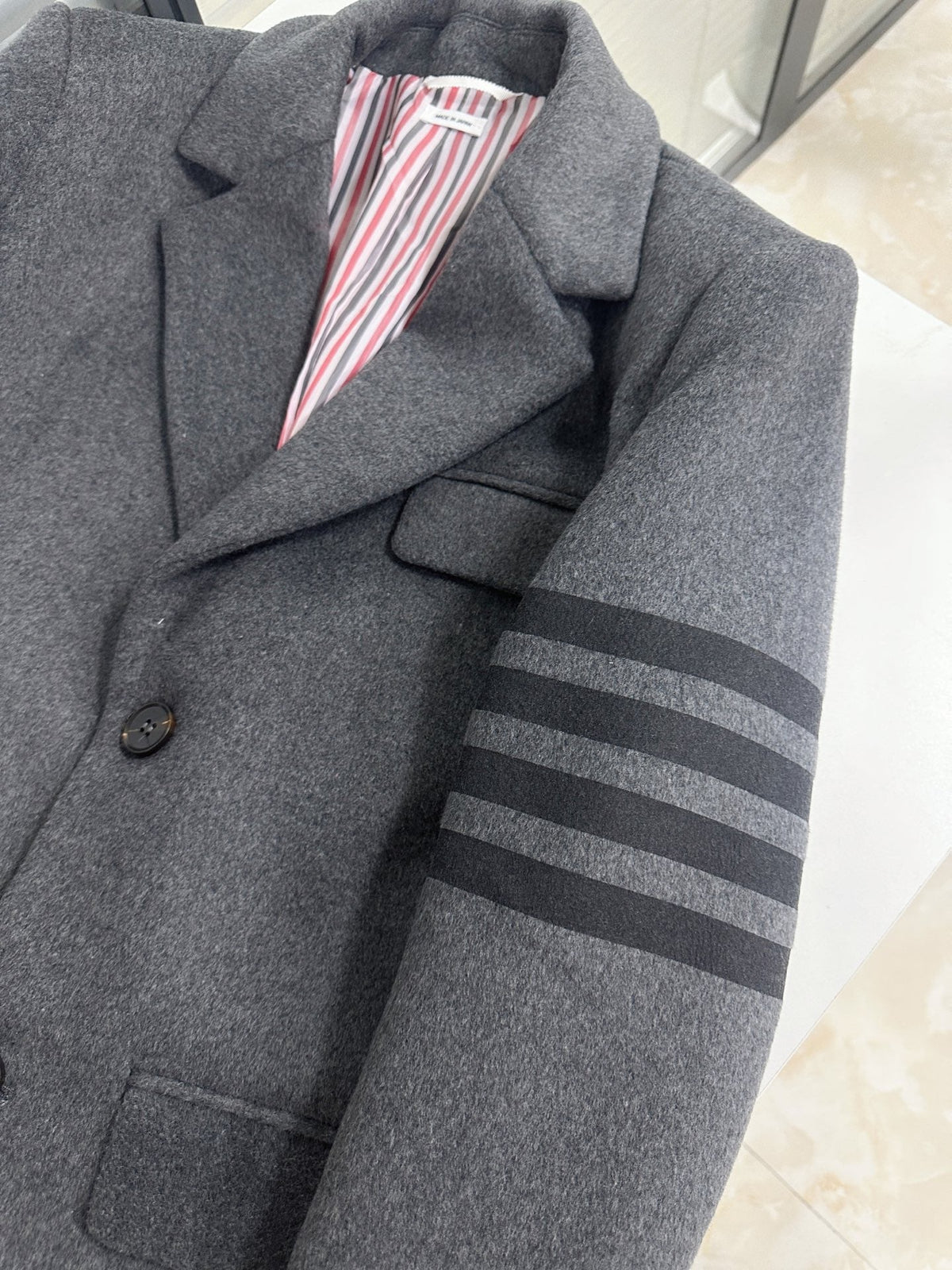 Unisex long wool coat | Thom Browne